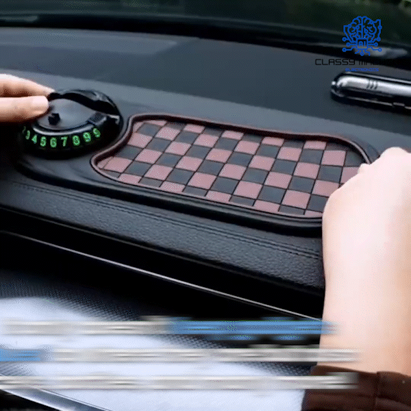 Hands adjusting the SlideGuard Pro - Multifunction Car Anti-Slip Mat on a car dashboard for secure storage.